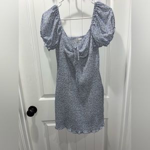 Tight fitting floral dress. Off the shoulder or on. Tie front.